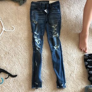 Blue jeans with rips in them
